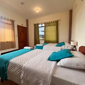 hostal-casa-cascada.puertoayorahotels.com/